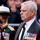 Image for article titled Heckler Arrested for Calling Prince Andrew a 'Sick Old Man' As He Follows Queen's Casket